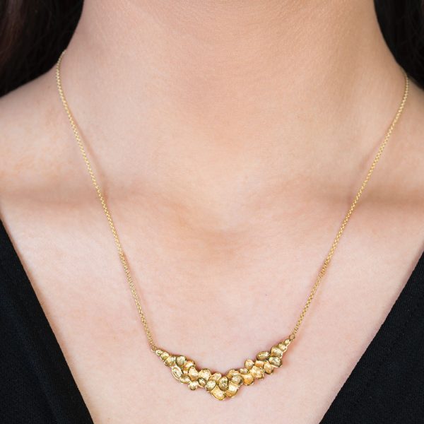 Yellow gold falling leaves necklace