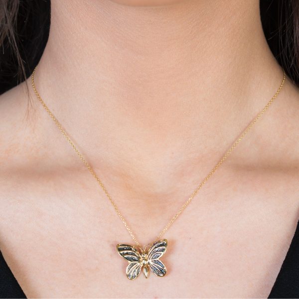 Yellow gold black diamond butterfly pendant