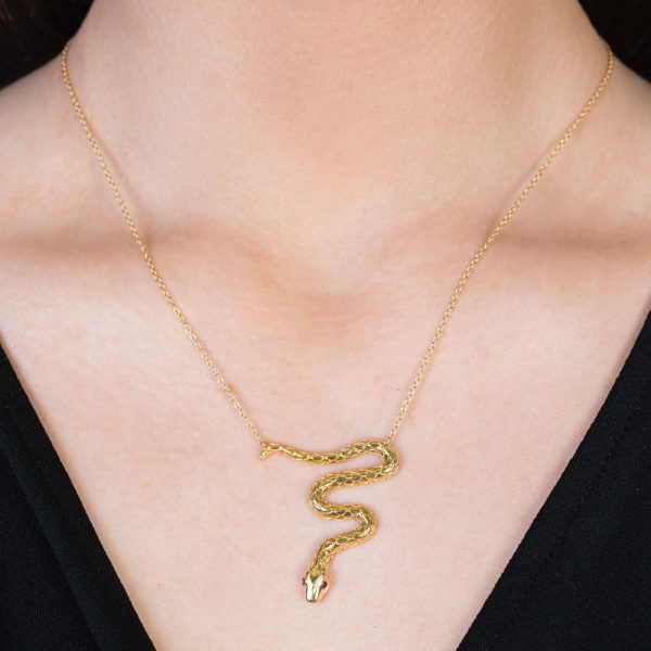Yellow gold ruby serpent necklace