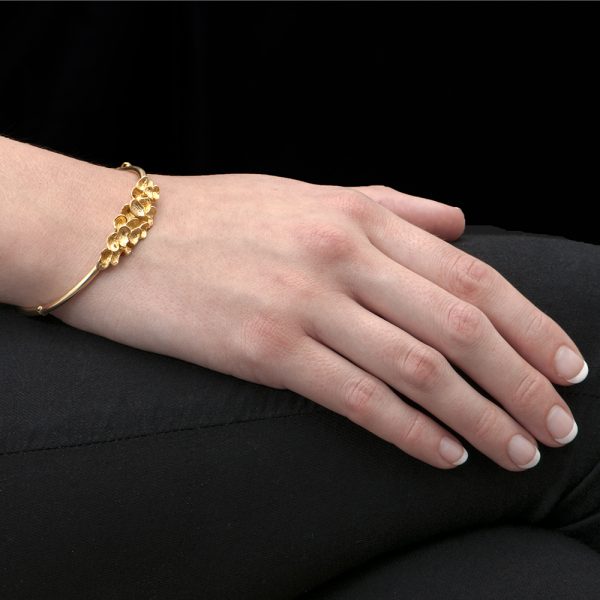 Yellow gold falling leaves bangle