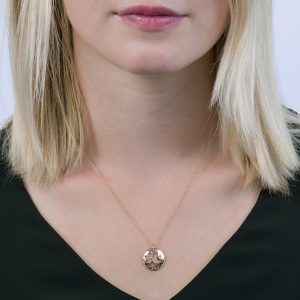 Rose gold moon/star cut out disc pendant